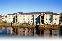 Row House Apartments, two stair well access 10 window bays per building. 