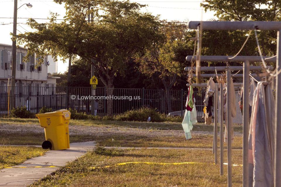 Low Income housing units with clothing drying in the Sun.  