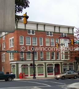 This is a photograph of a very large red brick building.