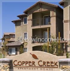 Rental sign for Copper Creek Apartment Homes.  These facilities provide privacy and convenient access to local shopping and entertainment facilities. 