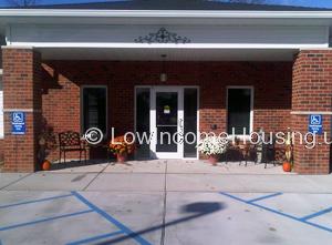 Entrance way to low income affordable housing.
Red brick entrance to rental office