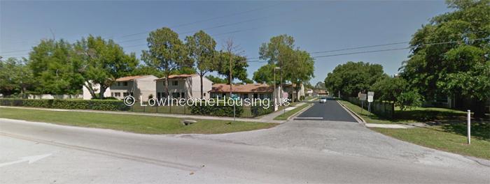 classic, two story row houses with large picture windows convenient street level parking, large, lush foliage provide ample summer shade.