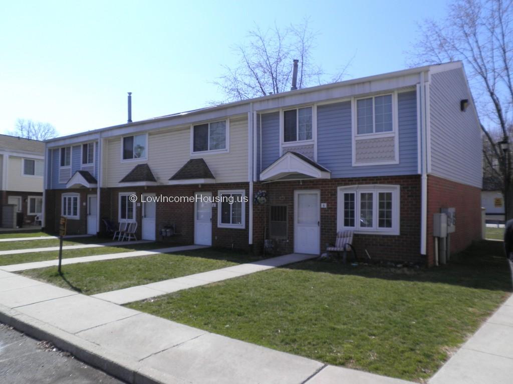 Classic row houses provide spacious living accommodations for small families and seniors.  Convenient curbside parking is available for each unit.