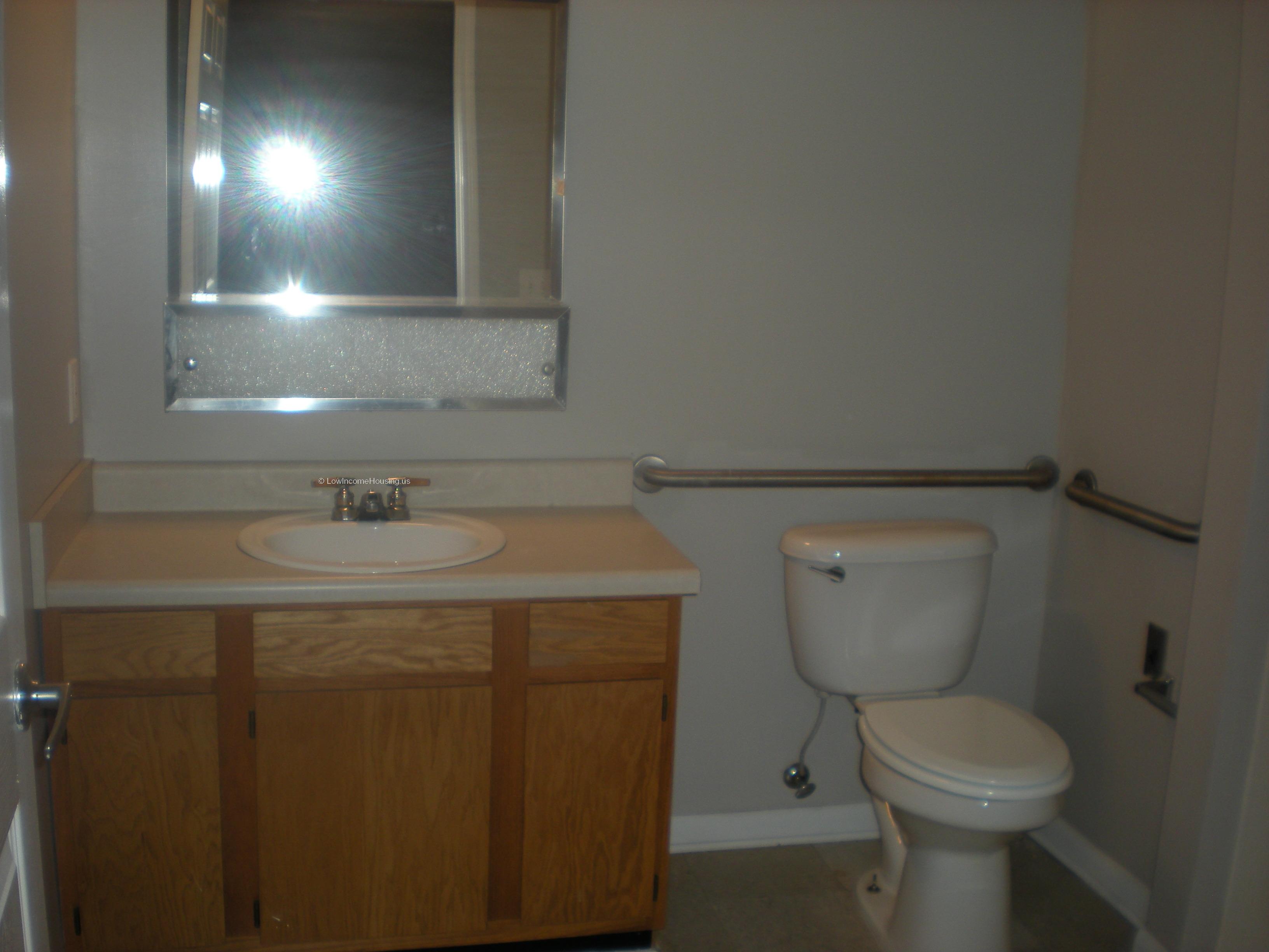 Interior view of Bath and Toilet units Hot and Cold water sink.