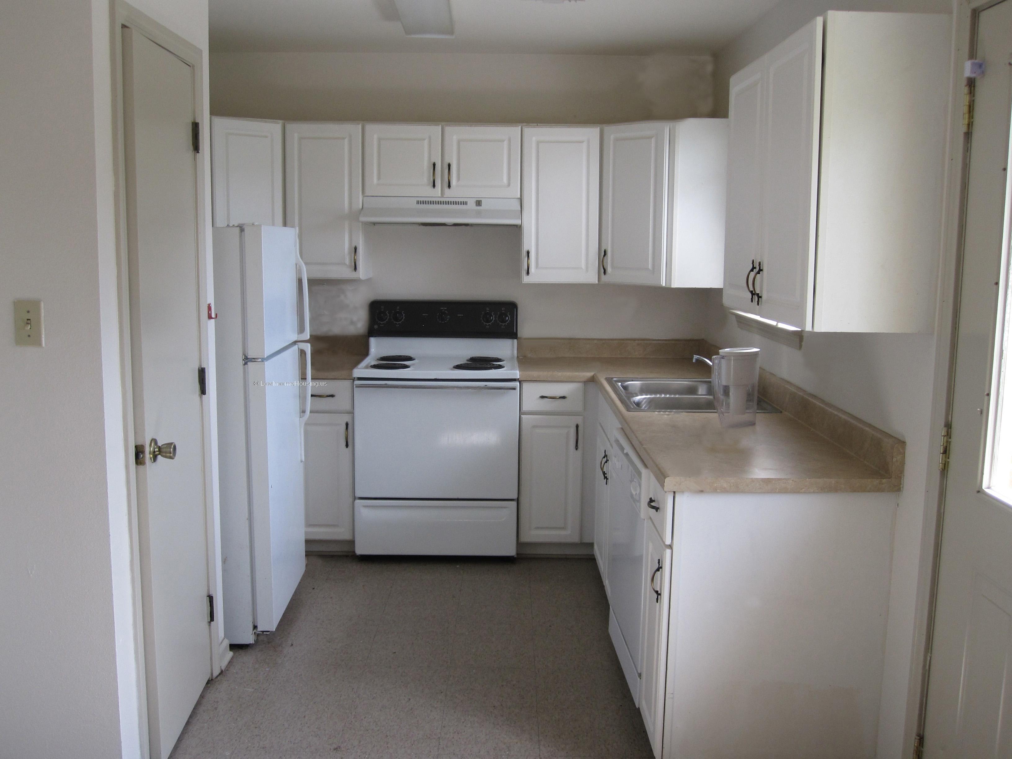 Carefully appointed kitchen with appliances, refrigerator, stove and dishwasher.  