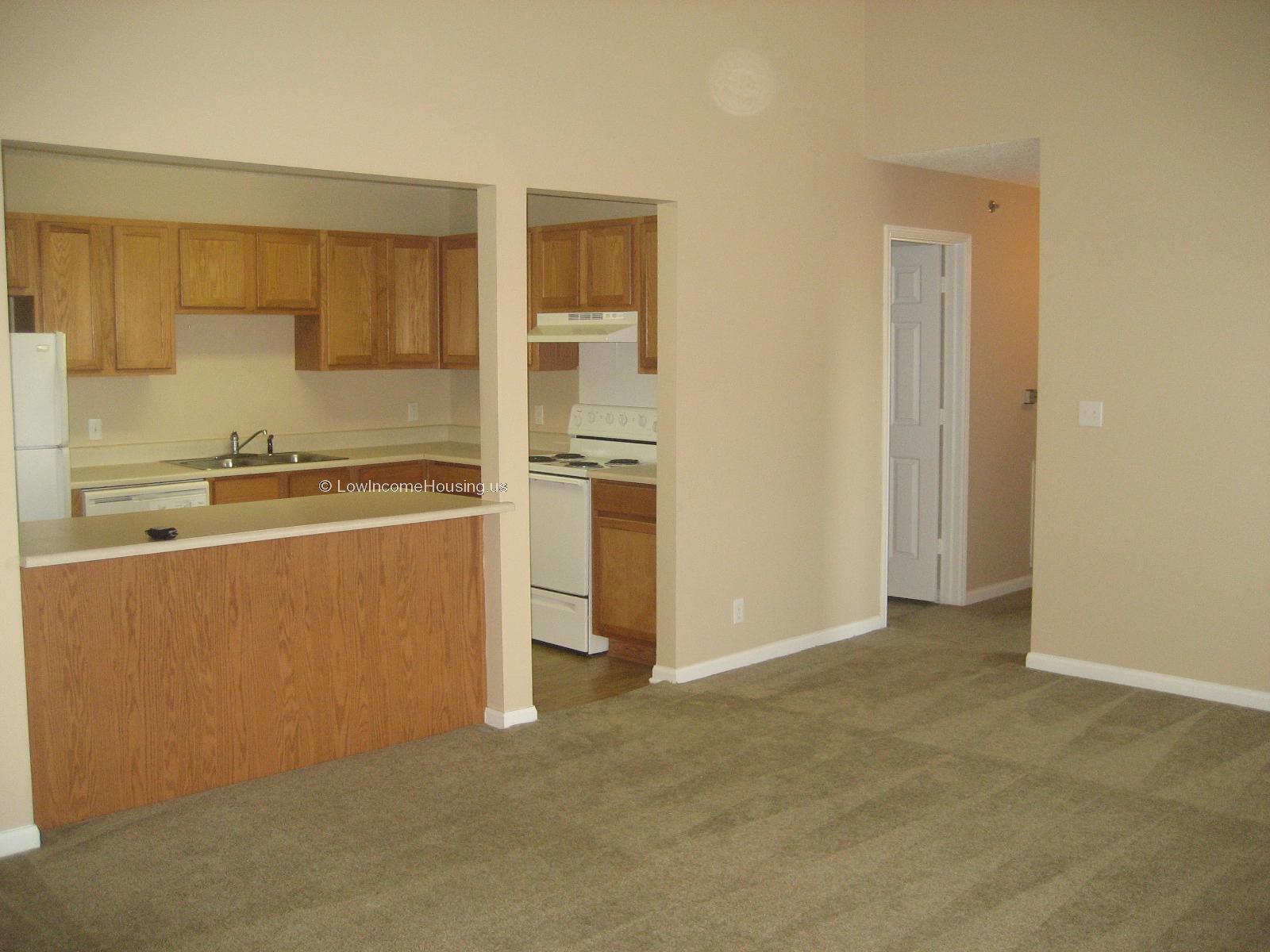 Spacious dining area, complete kitchen with all appliances, access to private living areas.