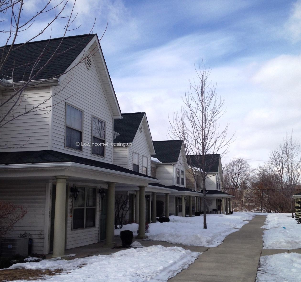 Secure Four Unit Housing with large steel window frames