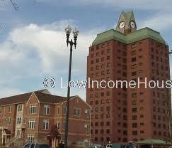 Classic red brick construction for this 14 story apartment complex with commanding watch tower and ample curbside parking