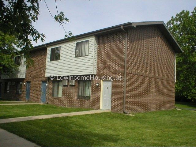 Classic red brick construction with tamper-proof steel window frames.  This unit could easily be converted to serve a commercial order processing activity.  Work orders received would be verified.    