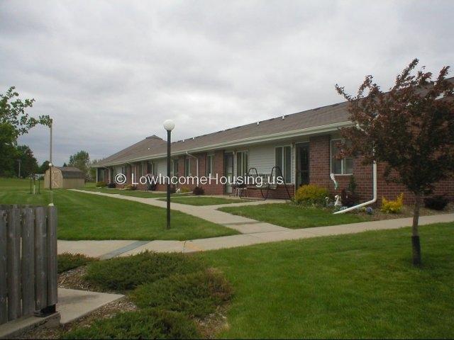 Classic red brick construction can be adapted to the most challenging requirements such as the large storage unit shown at the end of the walkway.