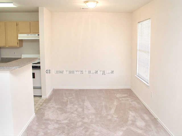 Apartment dining room with ample daylight exposure.