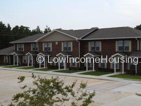 Senior living row housing units with convenient street level parking.  Each unit equipped with air conditioning units.   