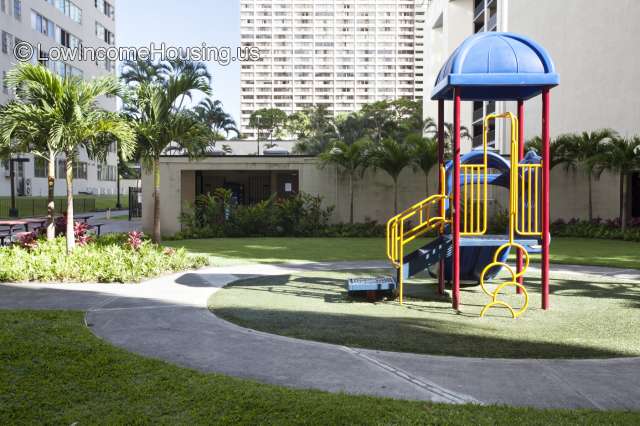 Large jungle gym with large plastic slide, plastic coating on railings and stairs