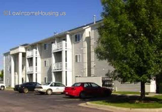 Wooden construction row houses with white painted finishing, abundant balconies for catching the afternoon sun.  Ample and convenient guest parking. 