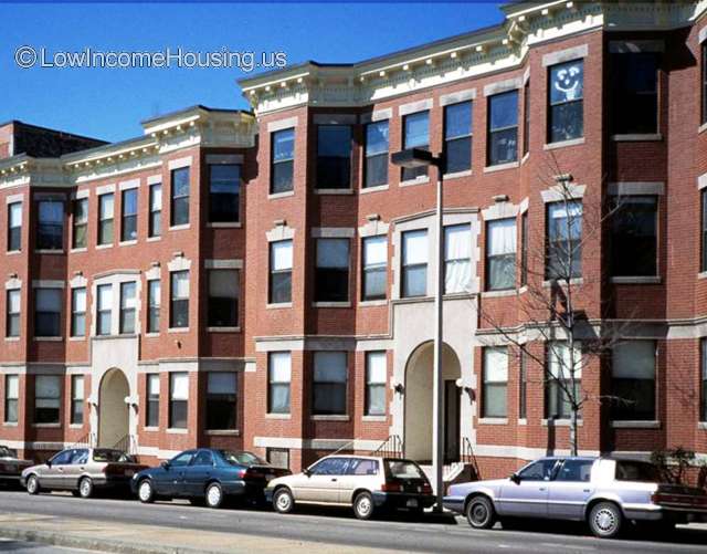 Red brick building with white concrete finishing.  Each unit contains 24 single occupancy residents.  