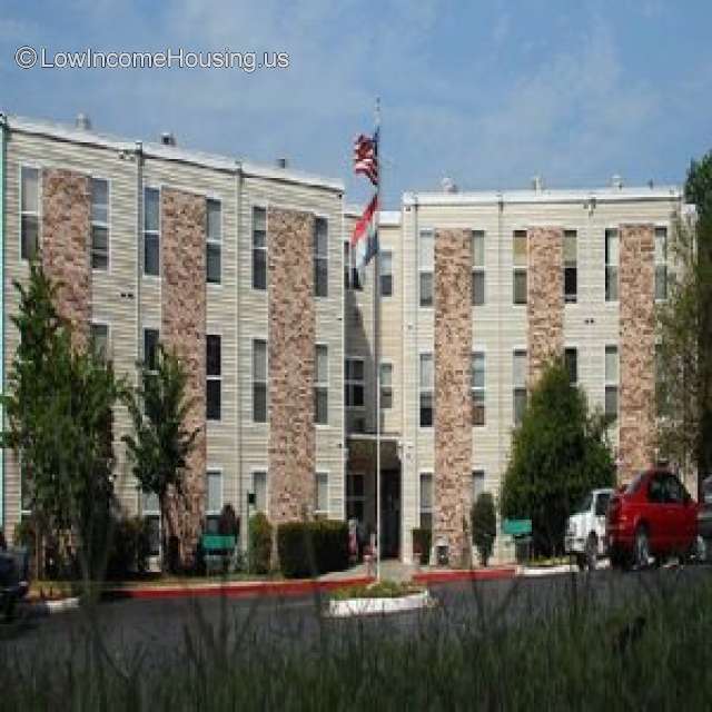 Corner formed by two three story apartment buildings