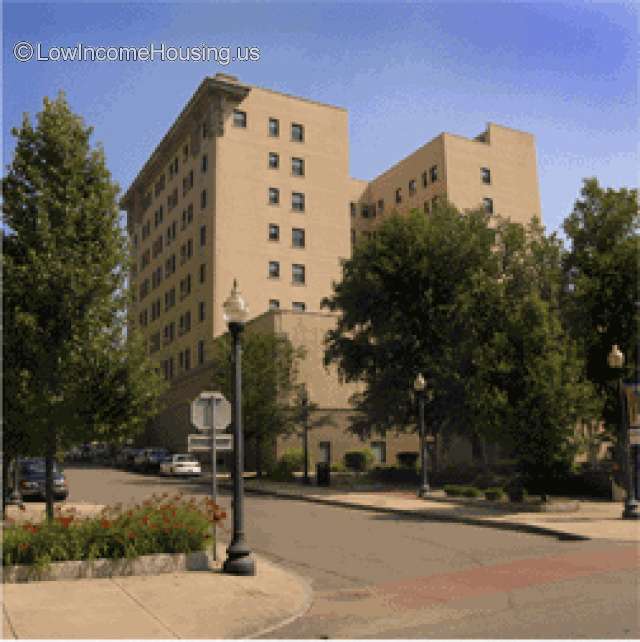 Street corner view of large 9 story building