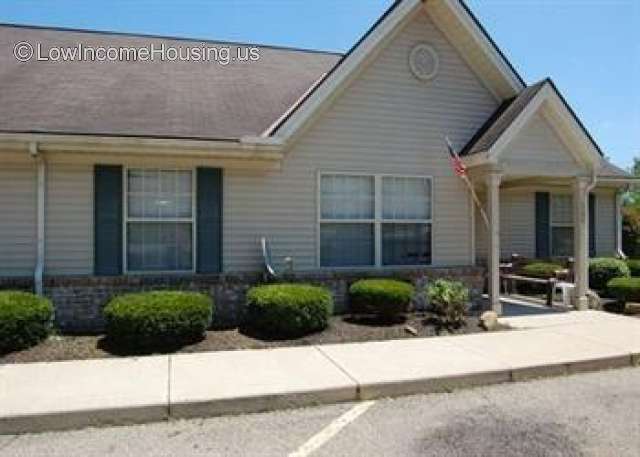 Simple wooden construction with white clapboard siding.