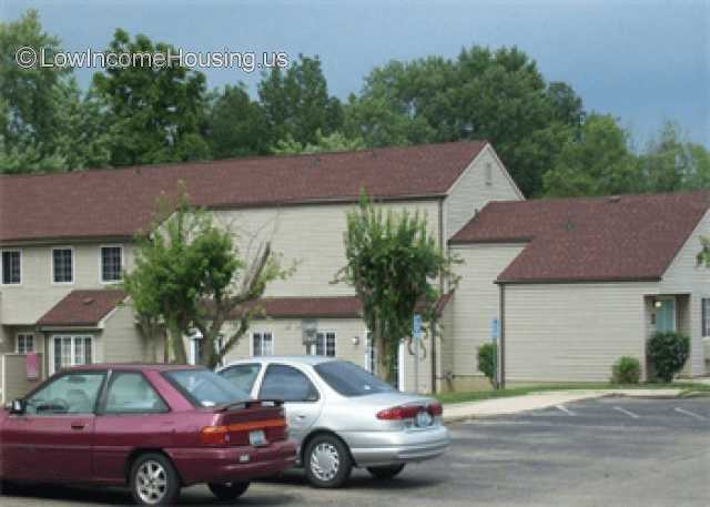 This is the scene of a parking area where visitors to the enterprise can safely leave their automobiles while they are on site conducting their business. 