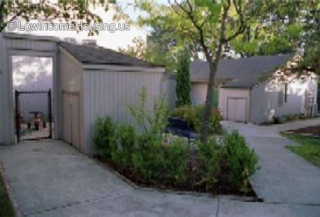 Photograph of two housing units with large doorways for ease of access for loading and unloading household items. 