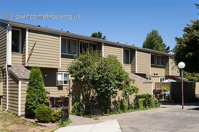 Classic row housing with dormer shelving, large picture windows and ample storage space.