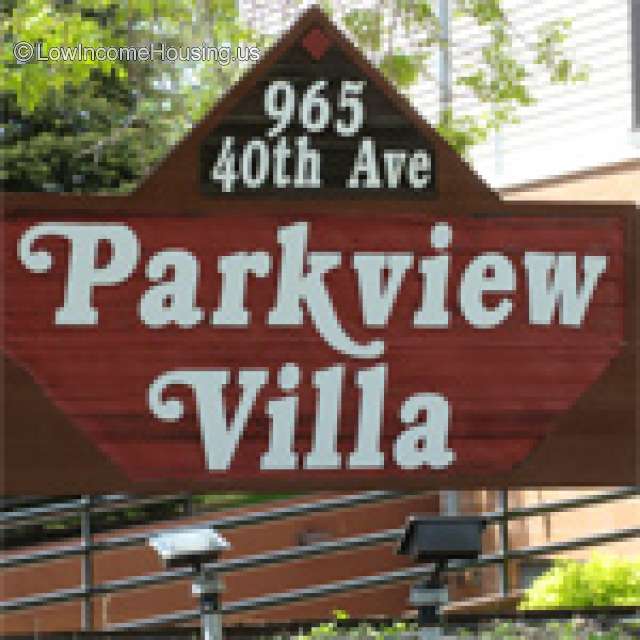 Sign of Parkview Villa with address.