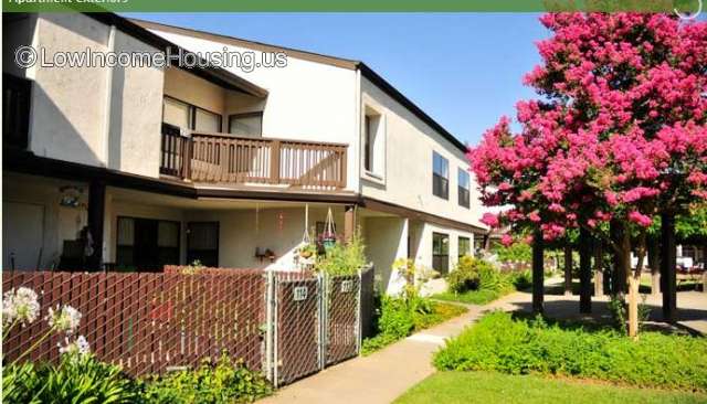 Two story town houses with fenced entrance way 