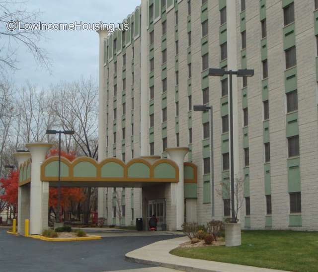 Large office building with awning to protect occupants from inclement weather. 