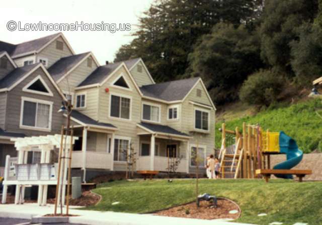 Wooden construction of living space - 7 dormer units with access to play ground facilities.