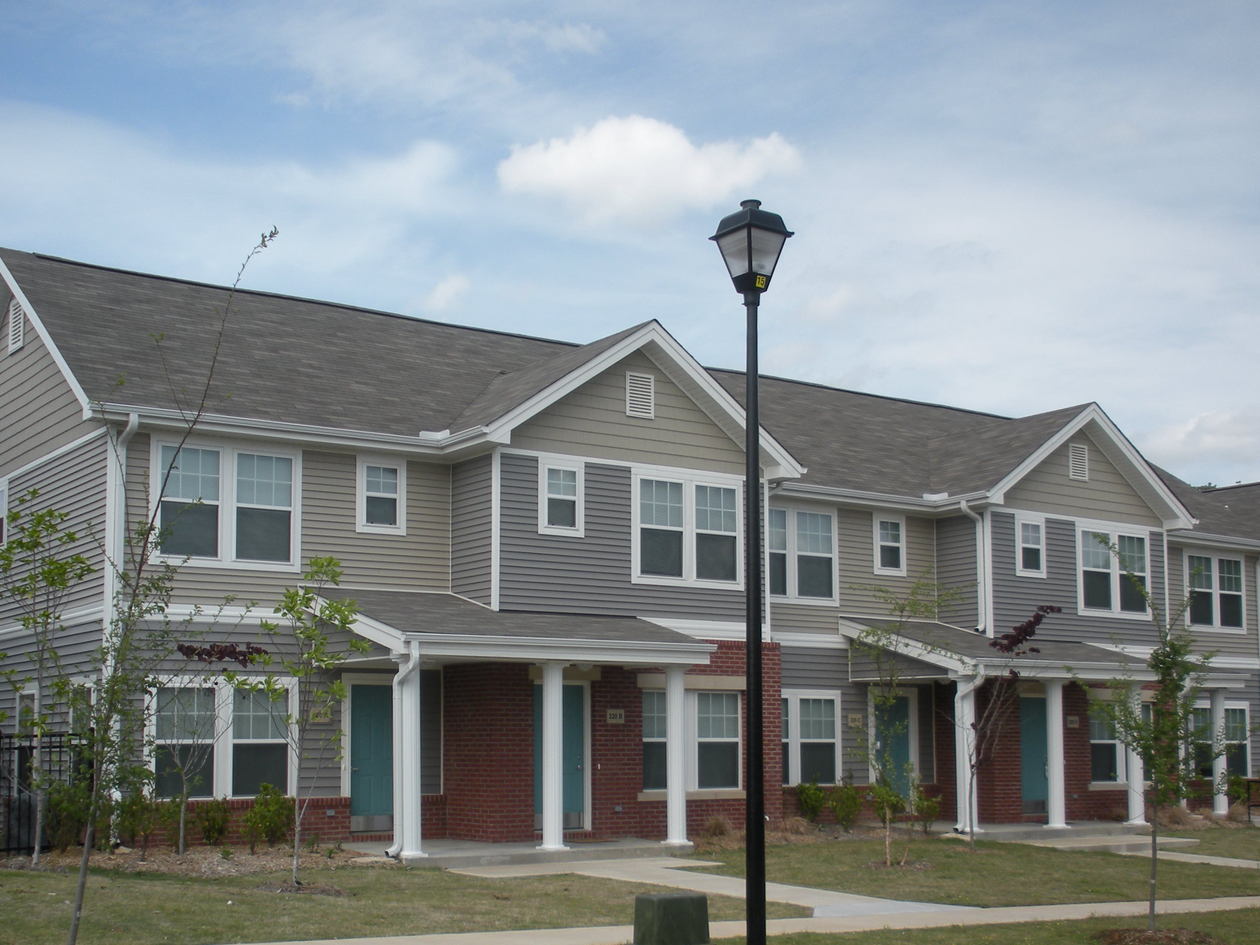 Metropolitan Village and Cumberland Manor Apartments 2801 S. Scott St